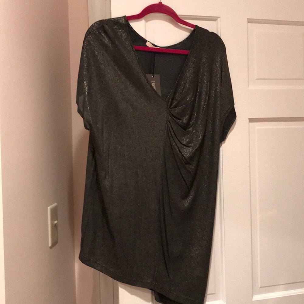 Shiny Asymmetrical tunic with pleats.